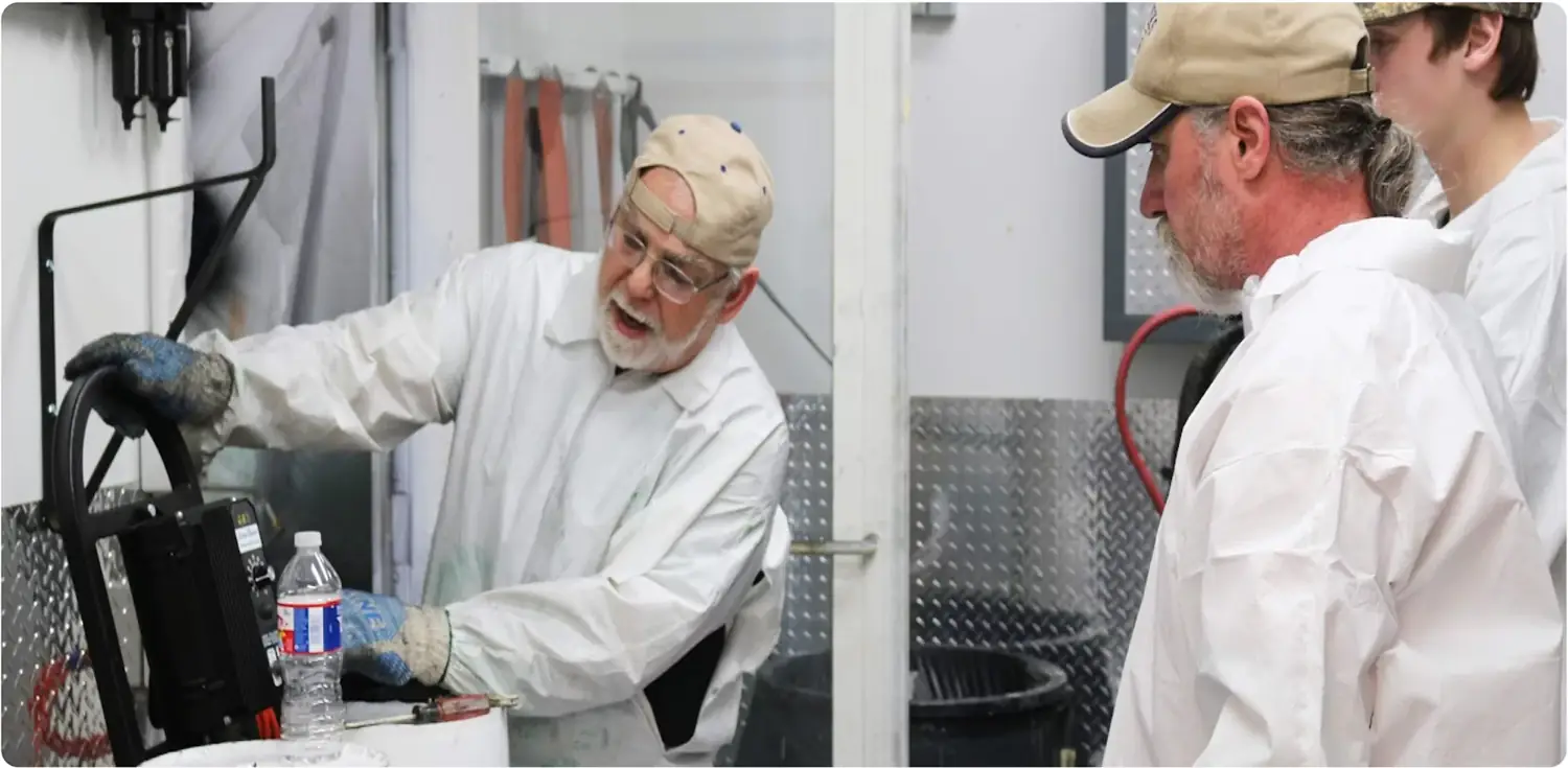 Hands-on spray training with an ArmorThane instructor
